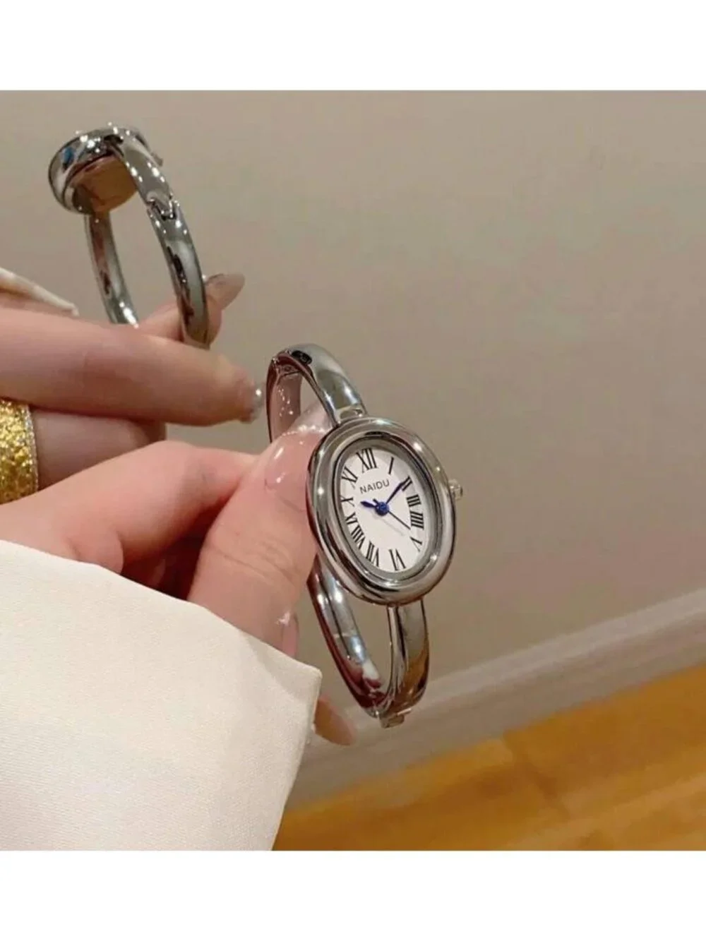 Women's Silver Bangle Bracelet Oval Dial Roman Numeral Elegant Style Wrist Watch